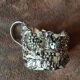Set of 3 small metal glasses and saucers