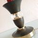 Brass lamp foot and art deco style wood