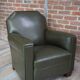 Fauteuil club art déco en skaï et bois