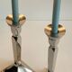 Pair of vintage cast aluminum candlesticks