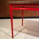 Custom modernist table, steel and earthenware.