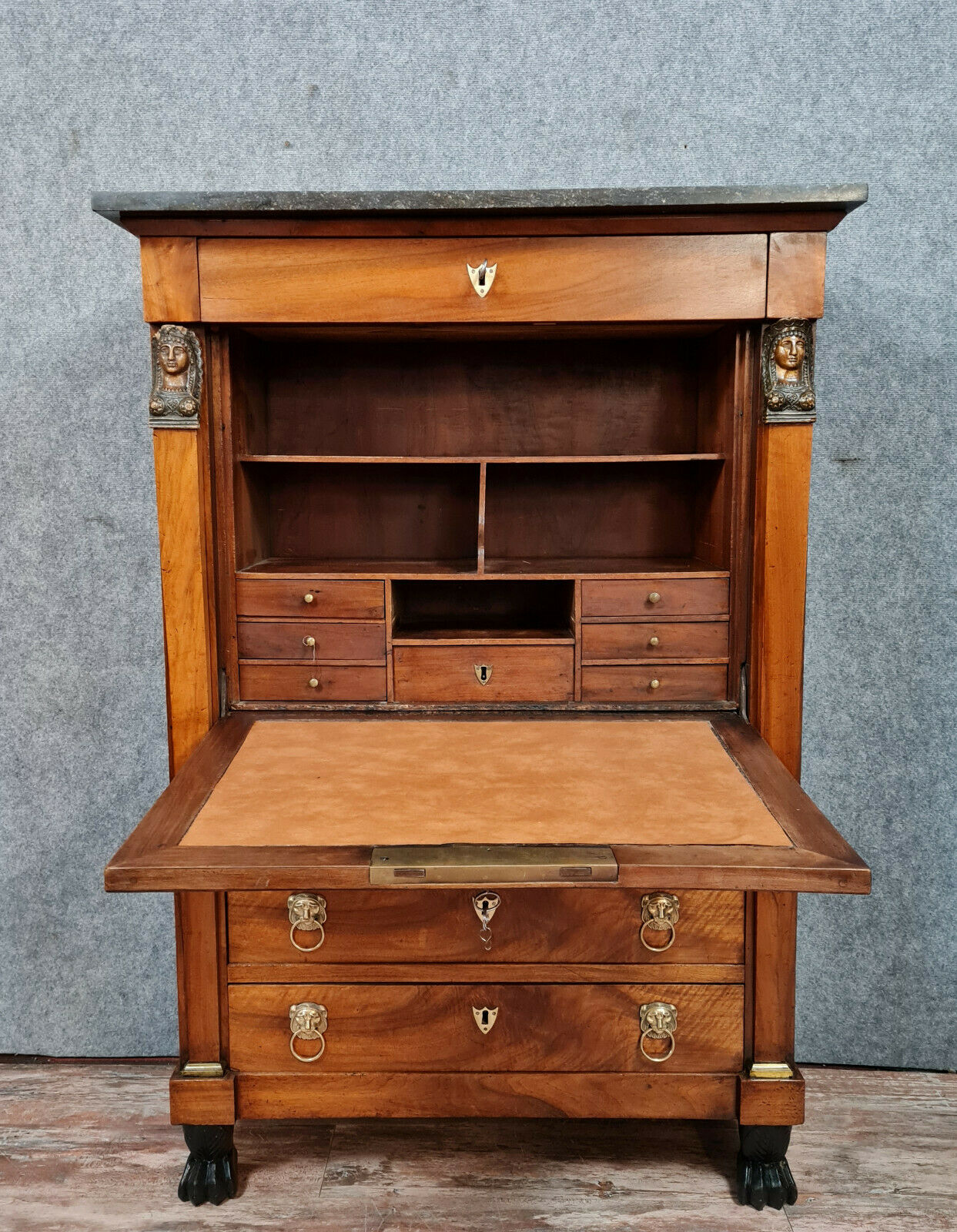 Secretary empire era with caryatid in blond mahogany around 1810