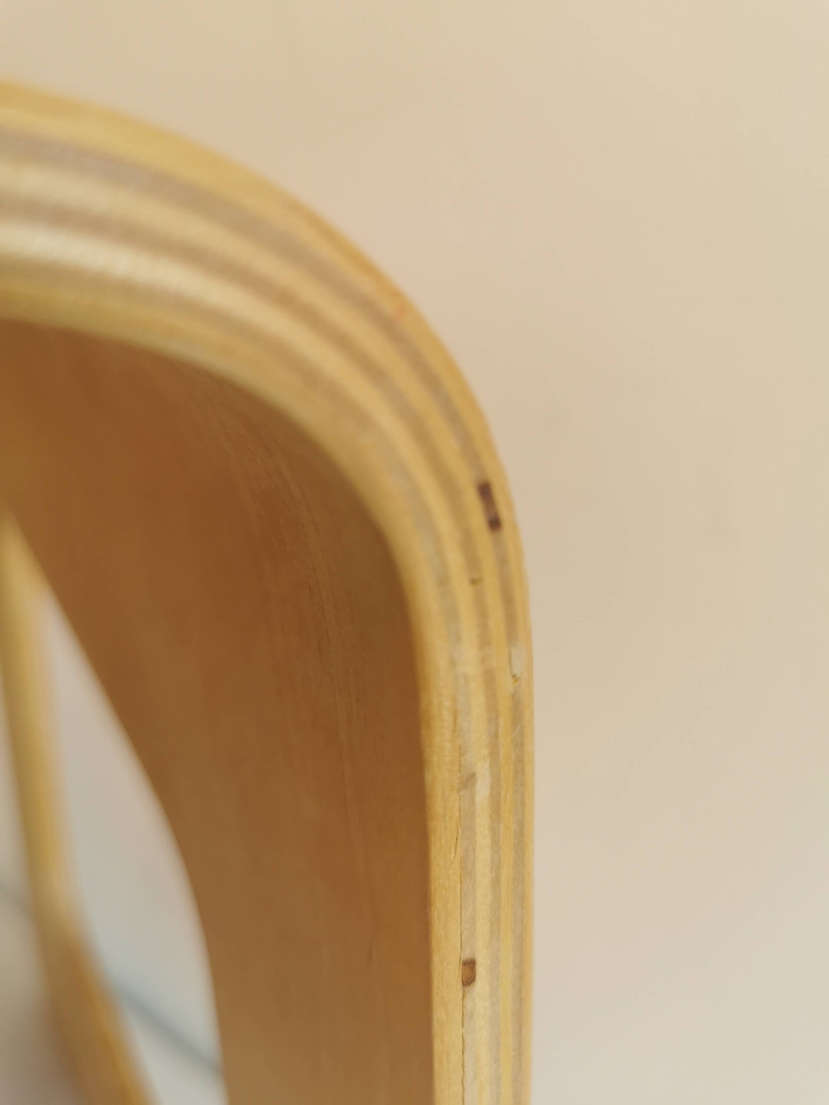 Design stool/side table made of curved plywood.