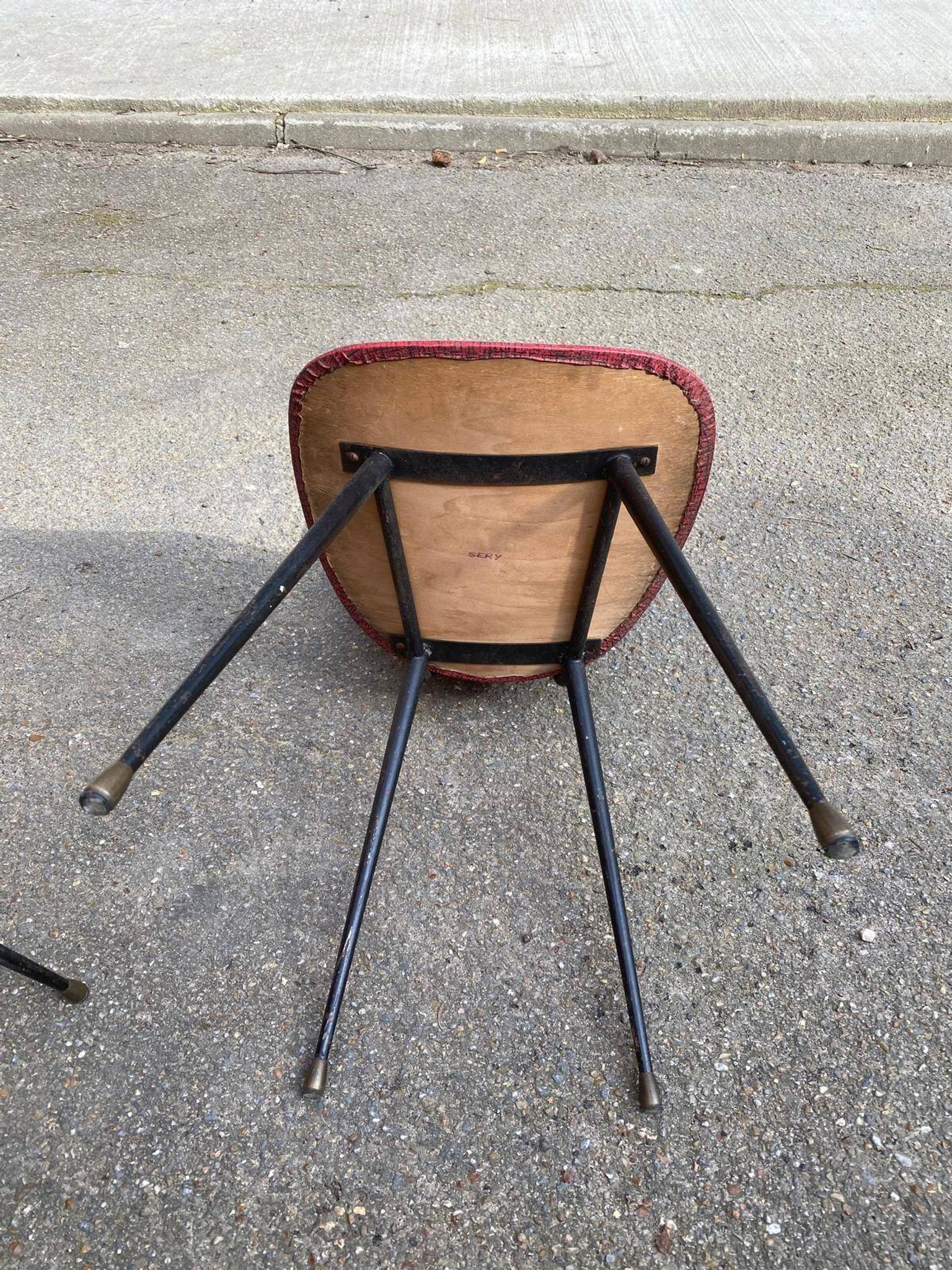 2 petal chairs in burgundy red skai leather and black metal 1950 Sery