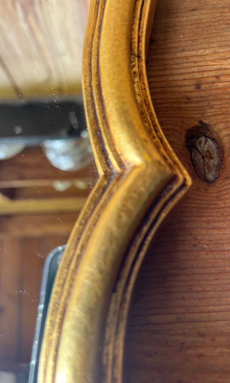 Old baroque gilded mirror