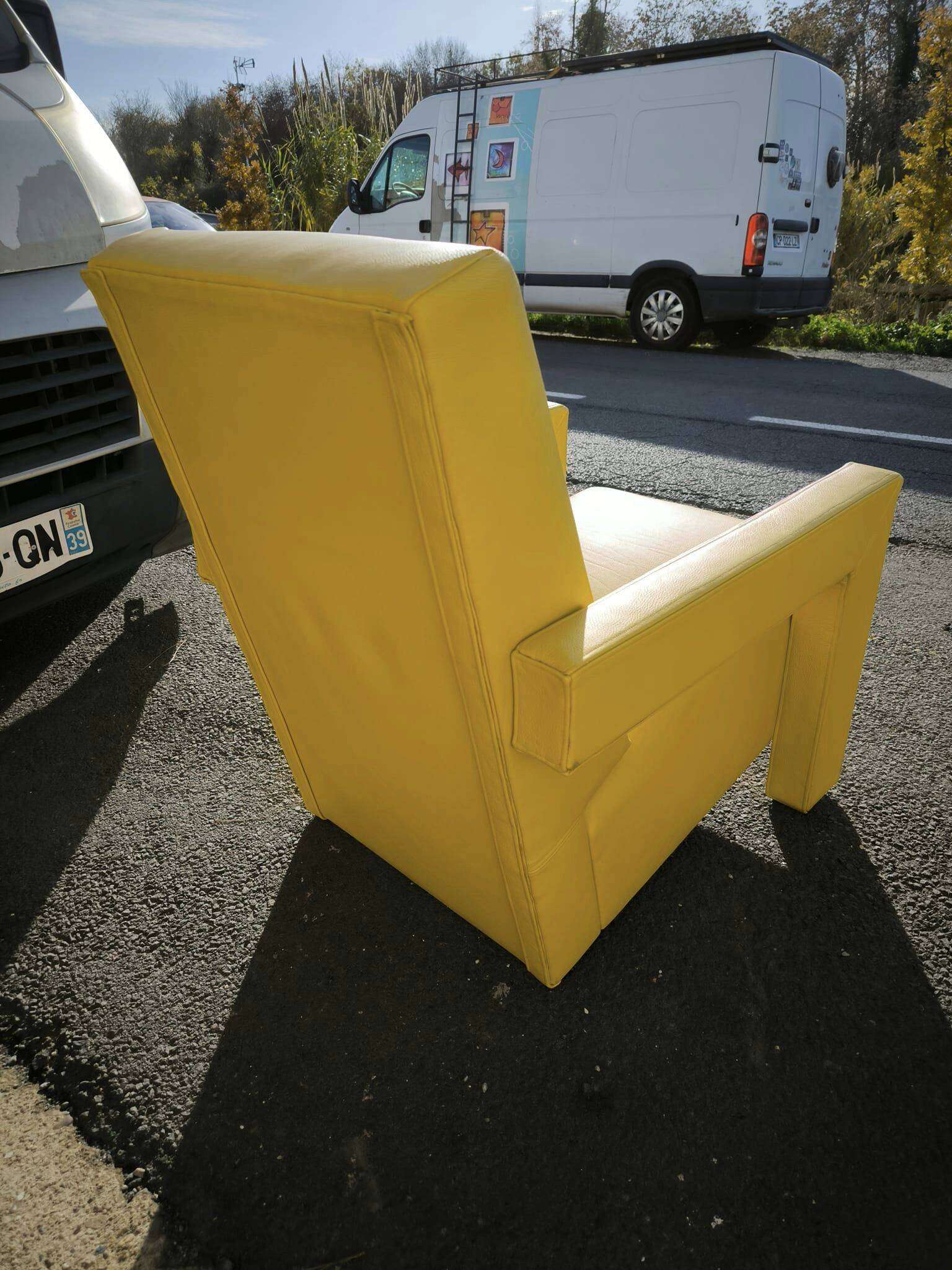 Pair of armchairs in sunny yellow leather