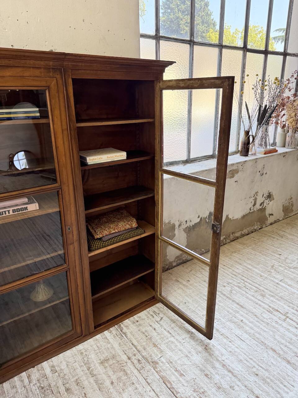 Glass-fronted walnut library 1900