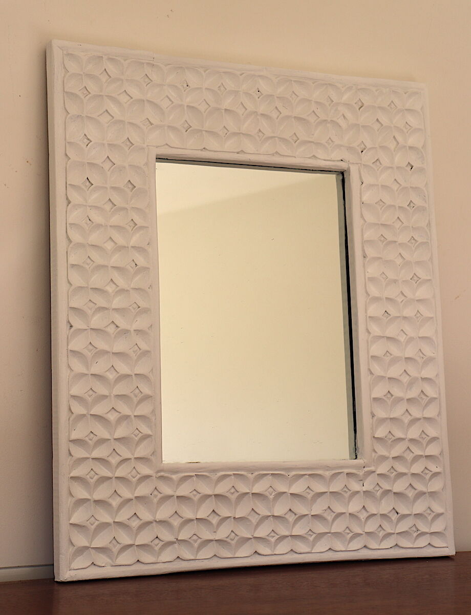 White mirror with carved flowers