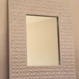 White mirror with carved flowers