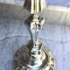 Pair of silvered metal candlesticks in the Louis XIV style.