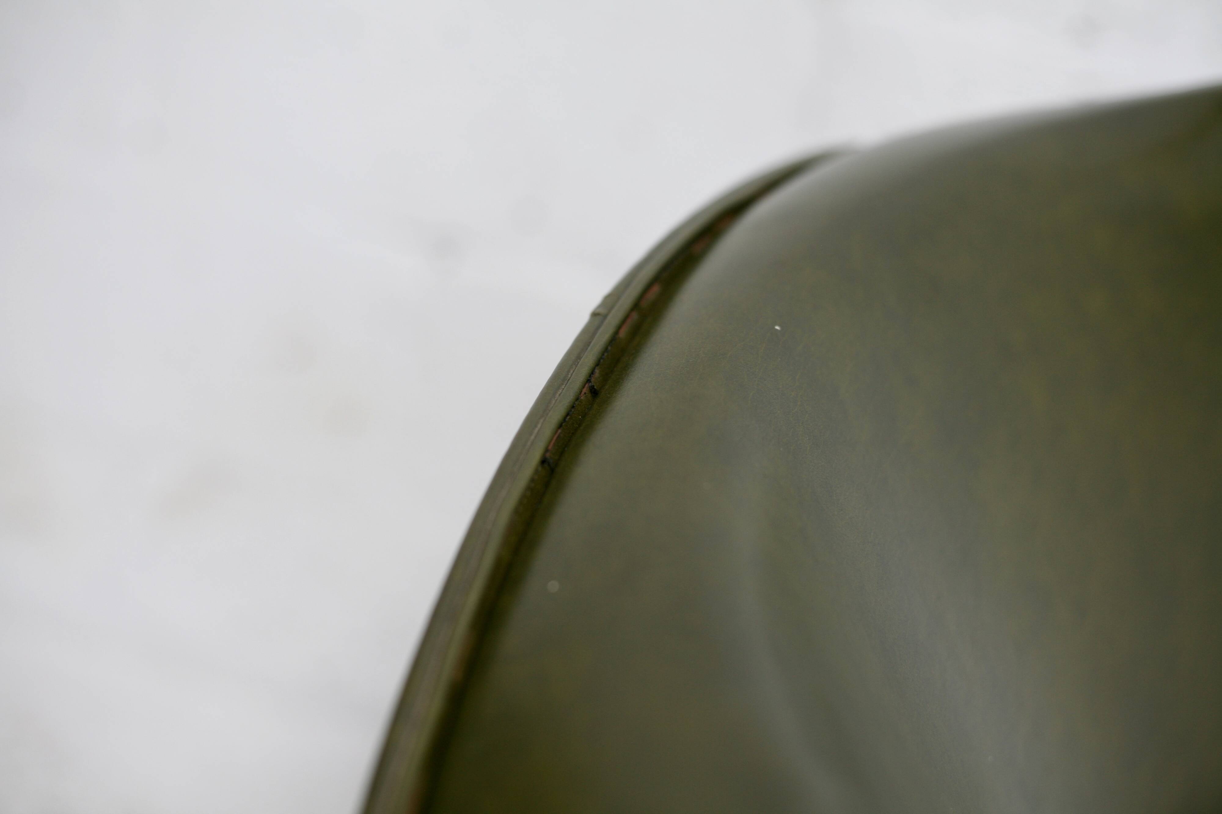 Pair of tubular armchairs, imitation leather. Circa 1950