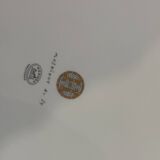 Mosaic tart dish in 24-carat gold by Hermès