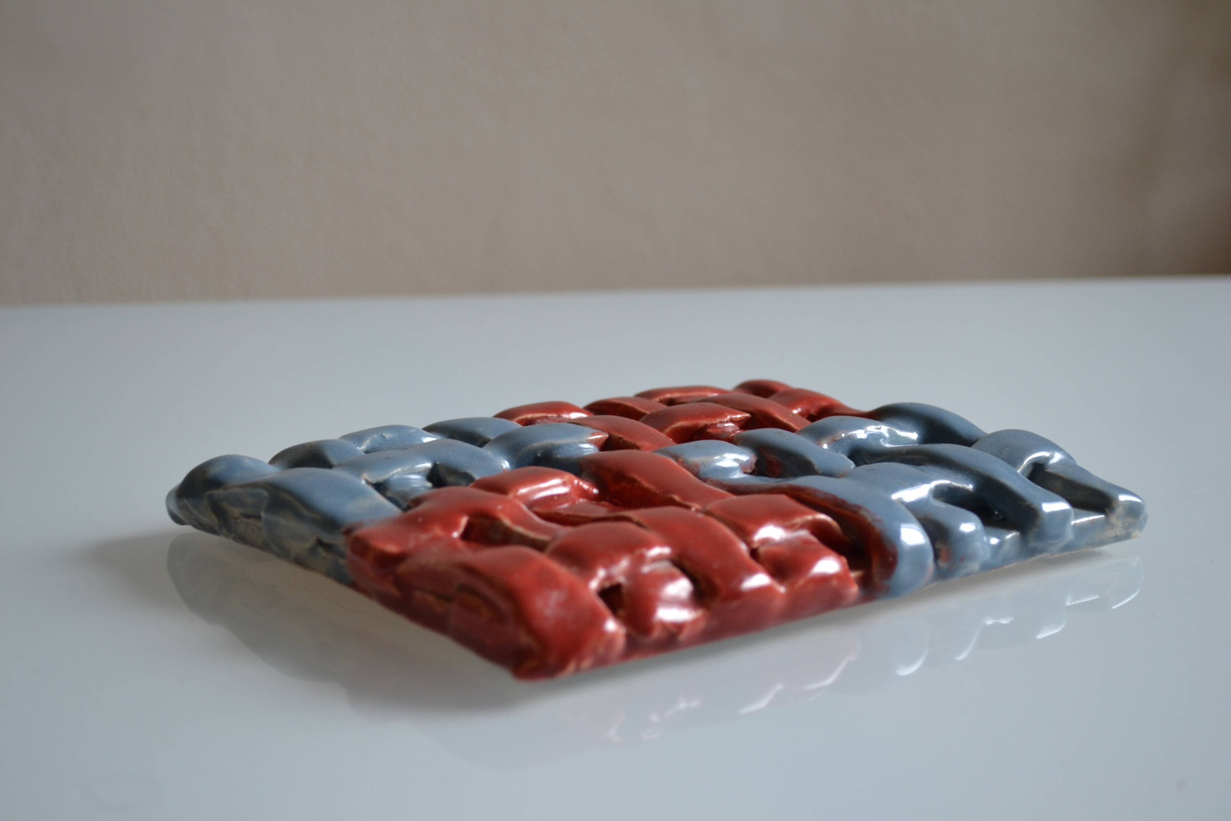 Vintage 1970 woven ceramic rest or trivet