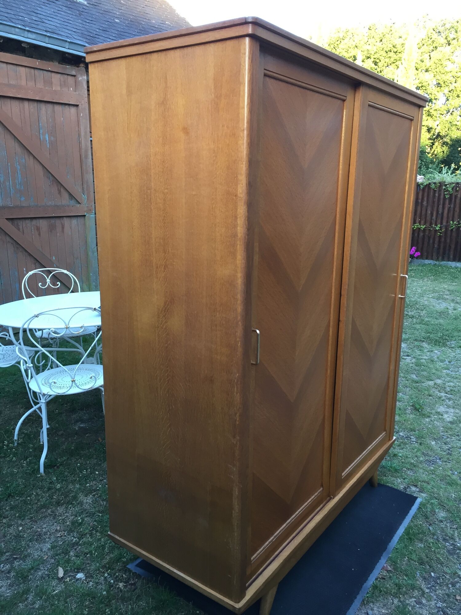 Vintage wardrobe with compass feet in oak and oak cp with 2 sliding doors.