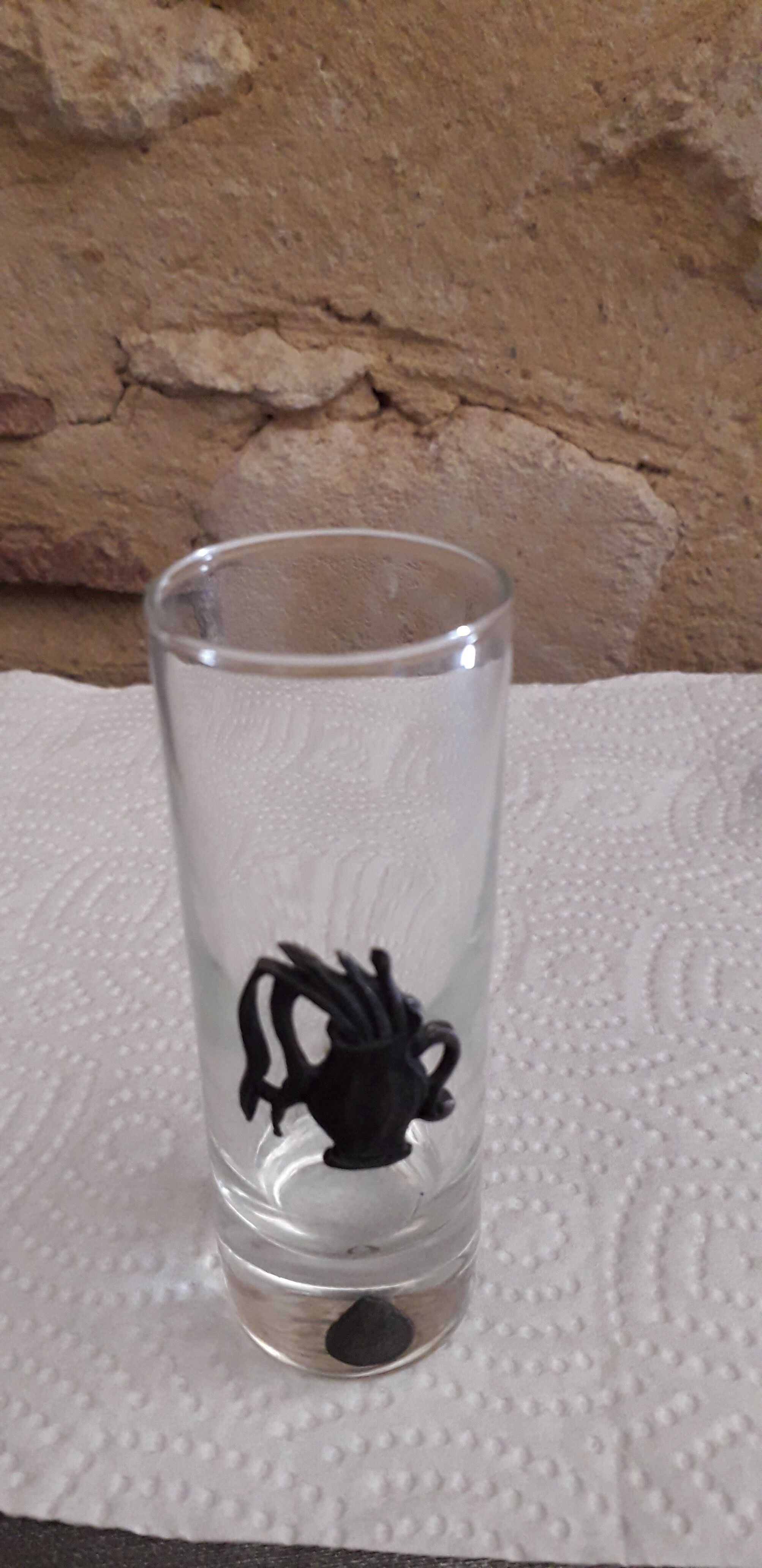 Glass liquor glass with tin sconces signed J.de Rey