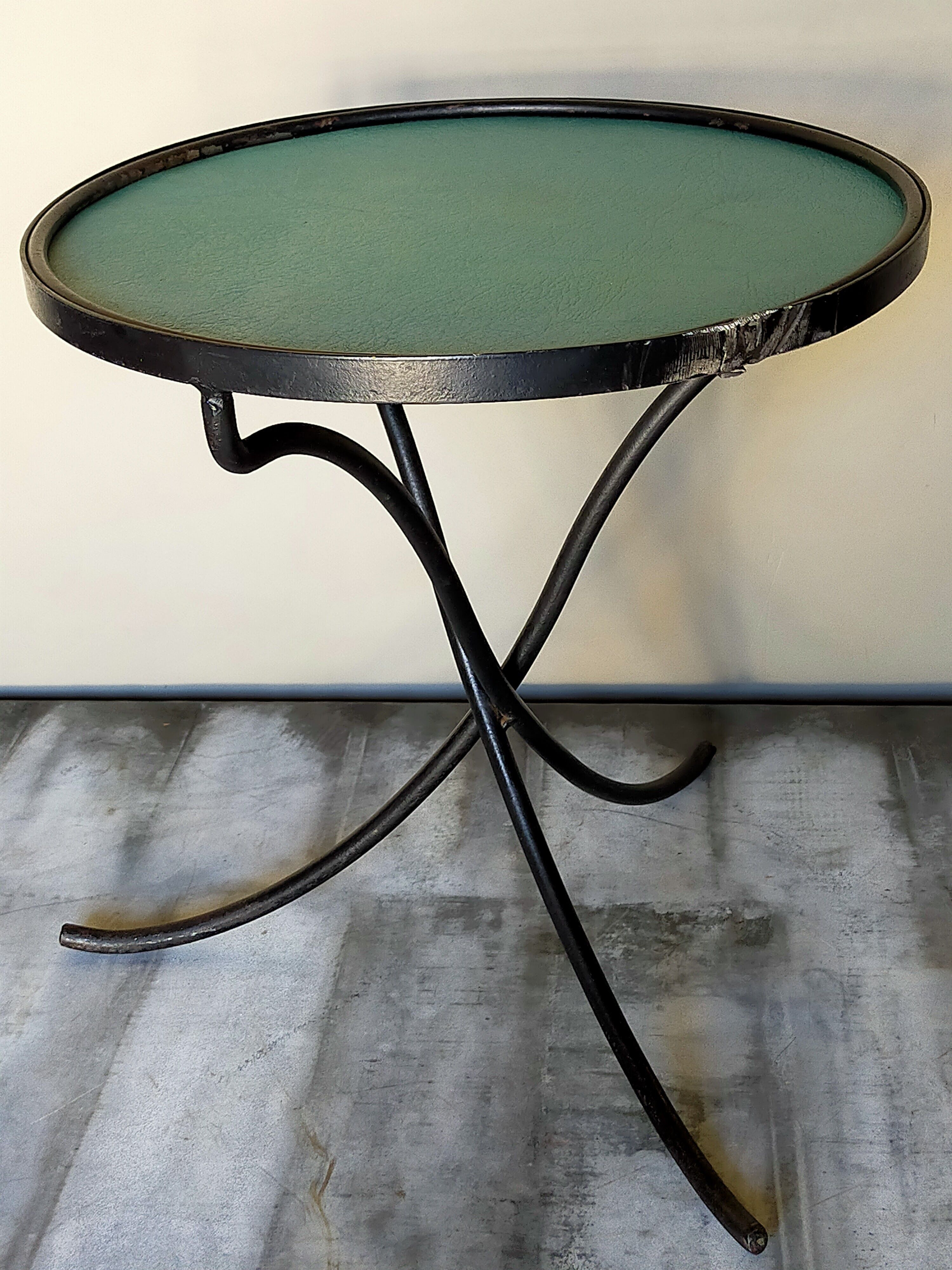 Wrought iron tripod healing in the 1950s