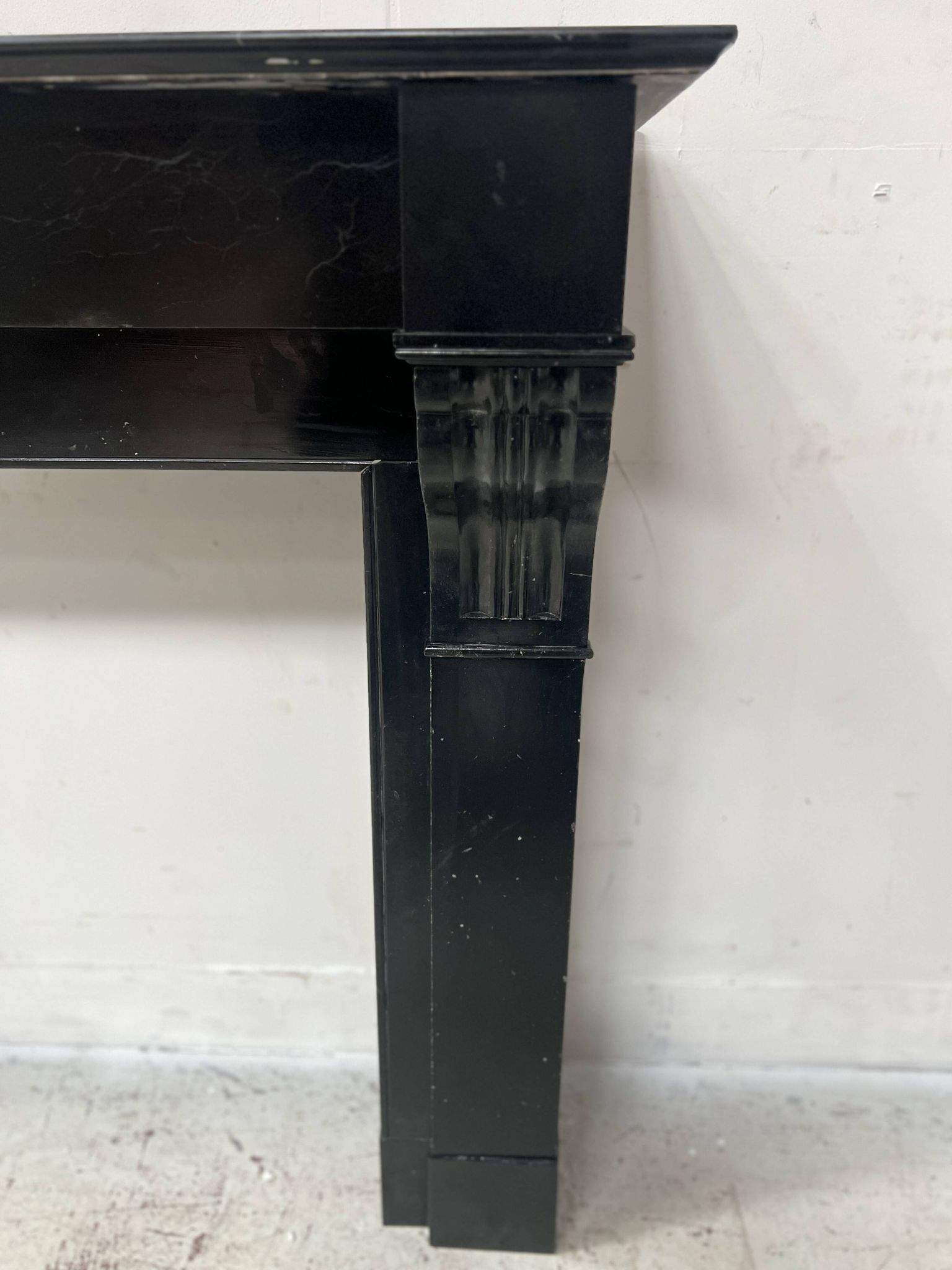 Napoleon III period fireplace with a black marble corbel. 19th century.