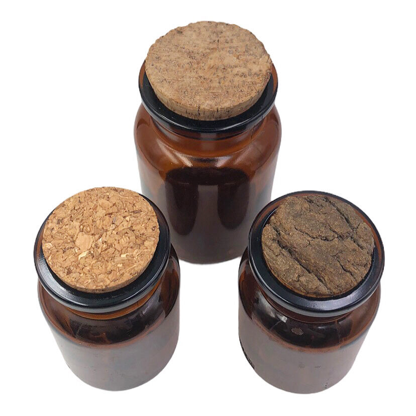 Three amber vintage jars