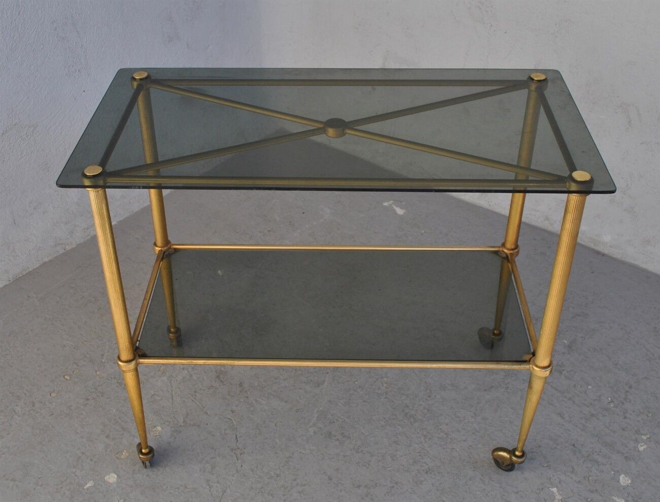 Serving style 1940 on gilded bronze smoked glass top