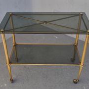 Serving style 1940 on gilded bronze smoked glass top