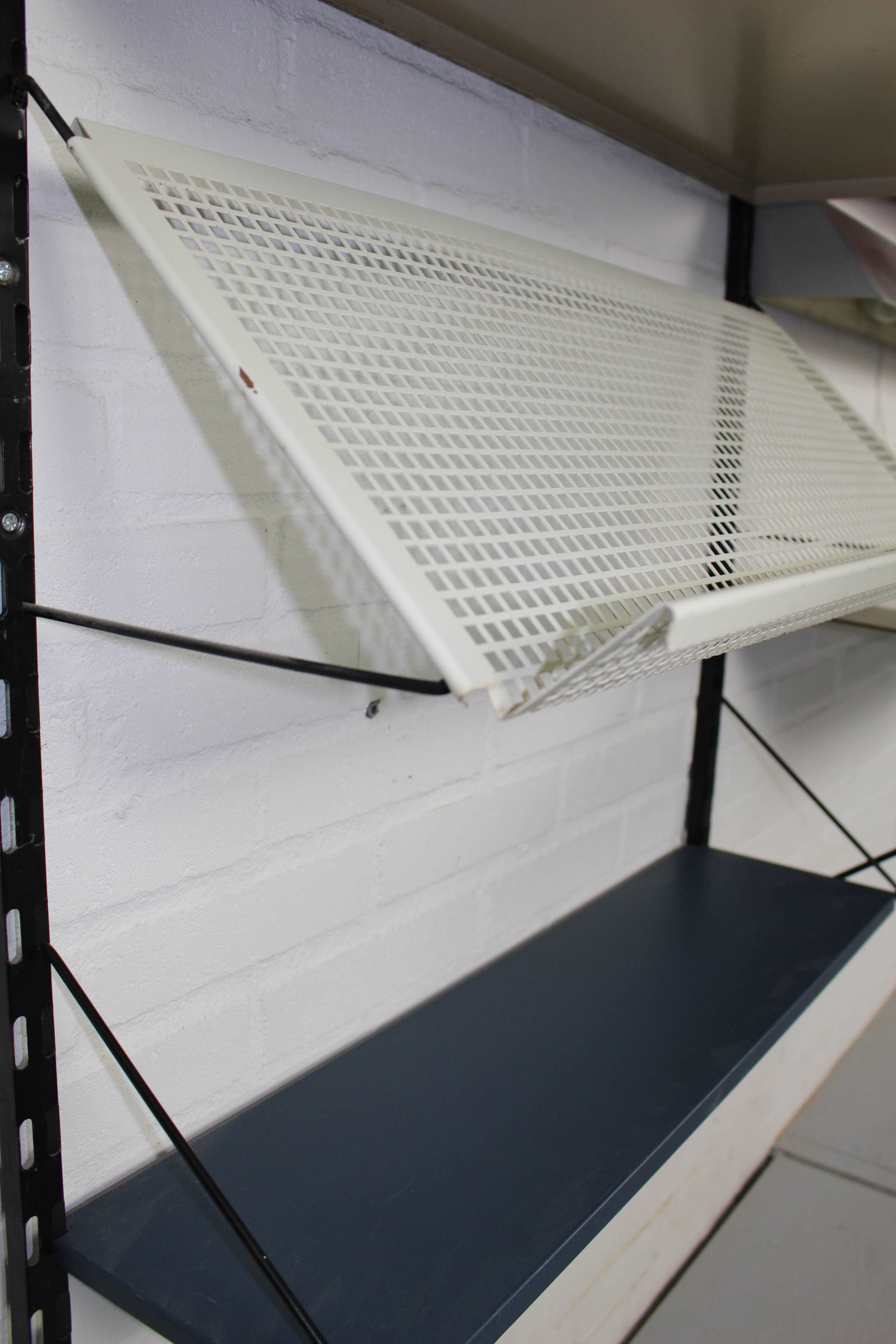 Wall Unit by Tjerk Reijenga for Pilastro with die cut magazine shelve