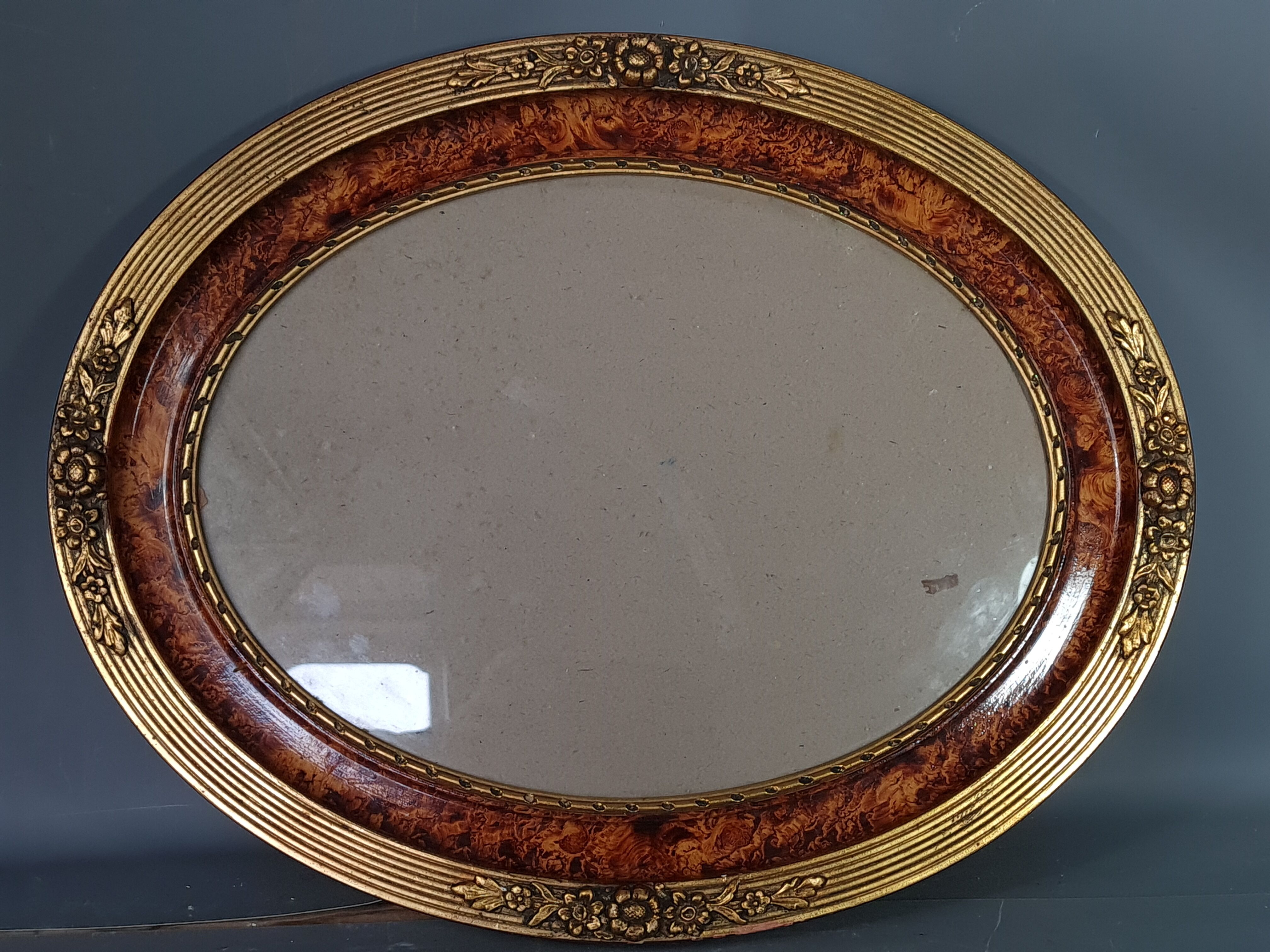 Old oval frame gilded stucco wood