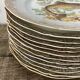 11 vintage Limoges porcelain fish plates