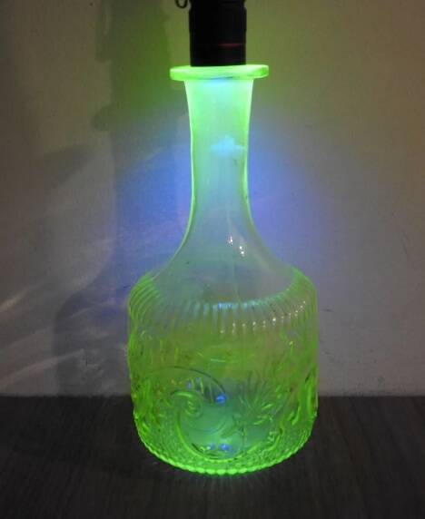 Antique uraline glass carafe bottle from the late 19th century
