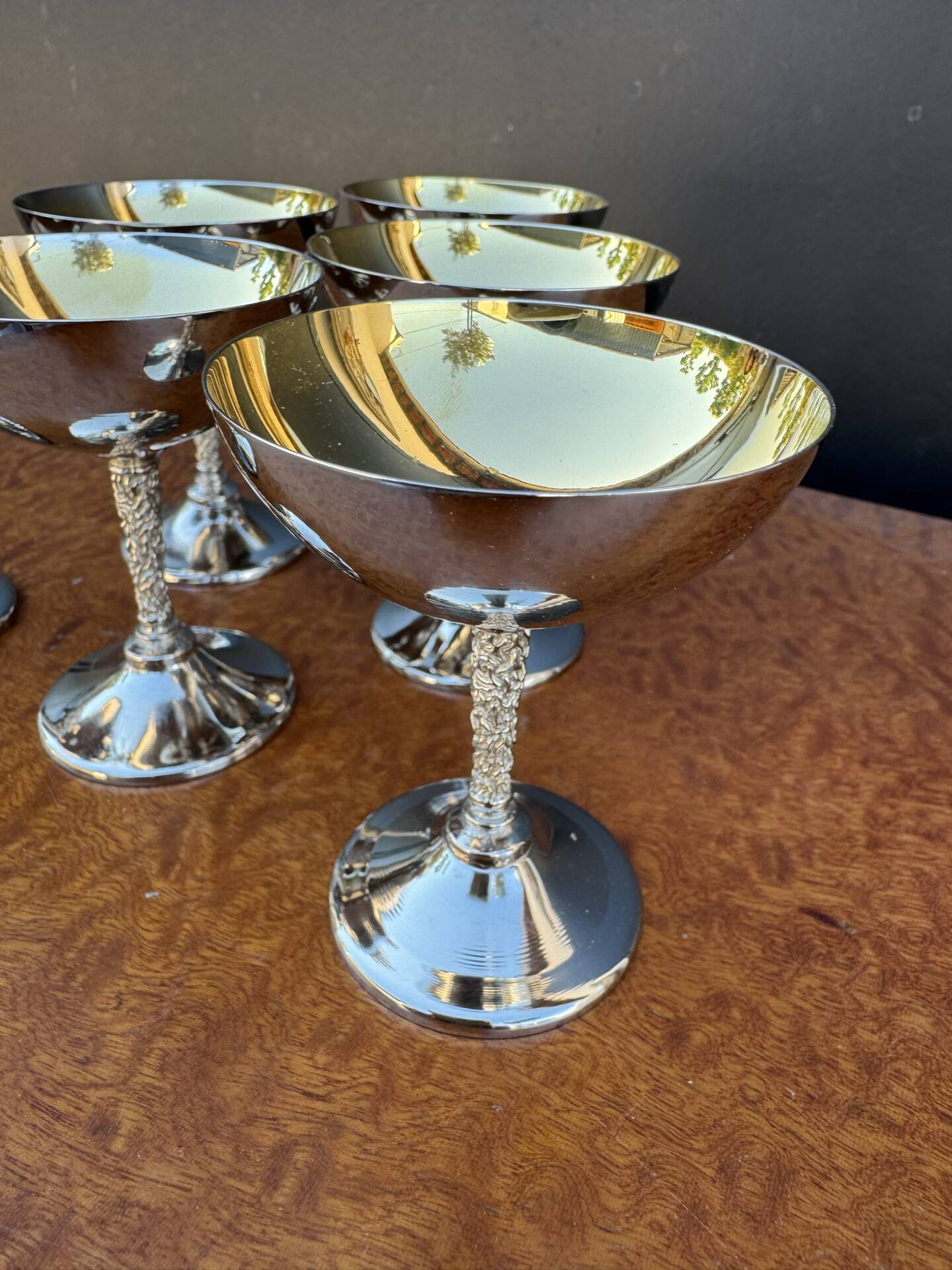 Silver-plated metal wine glasses on stems from the 1970s.