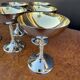 Silver-plated metal wine glasses on stems from the 1970s.