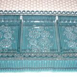 Antique dish in chiseled glass with pearls