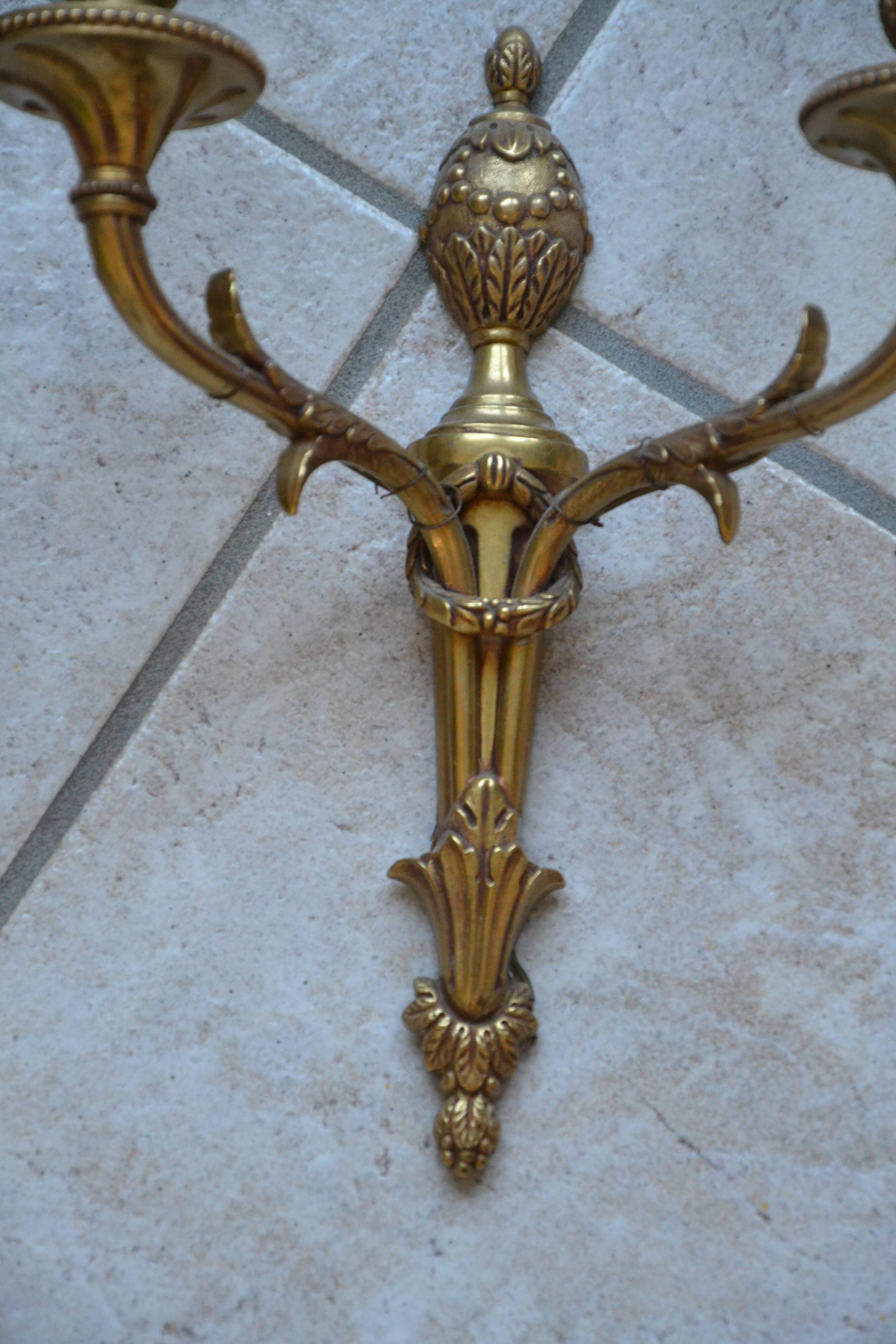 2 sculpted bronze wall lights