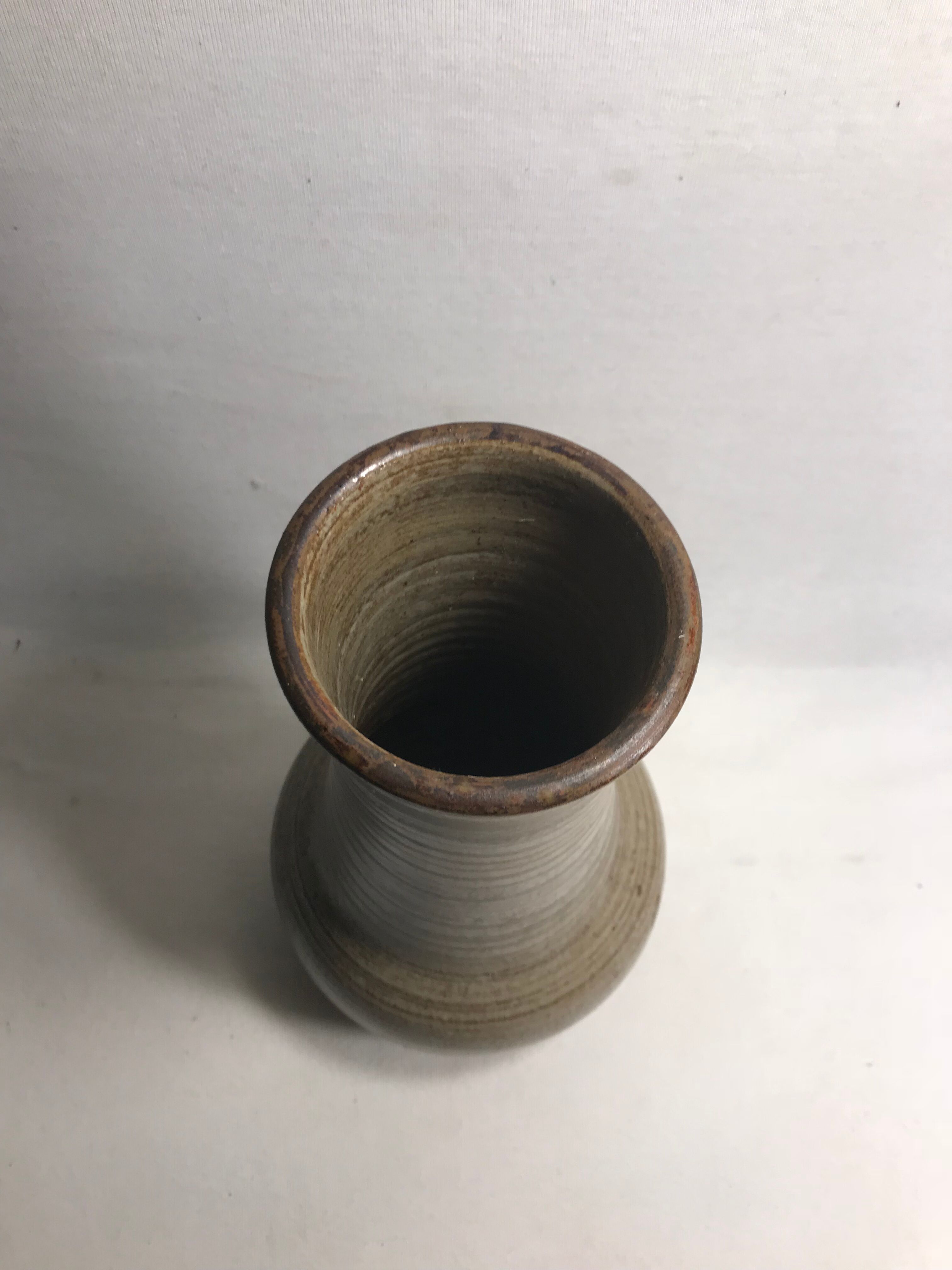 Old sandstone ball vase 1970