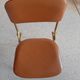 Chaise pliante structure tube et simili cuir