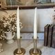 Pair of fluted column candlesticks in brass