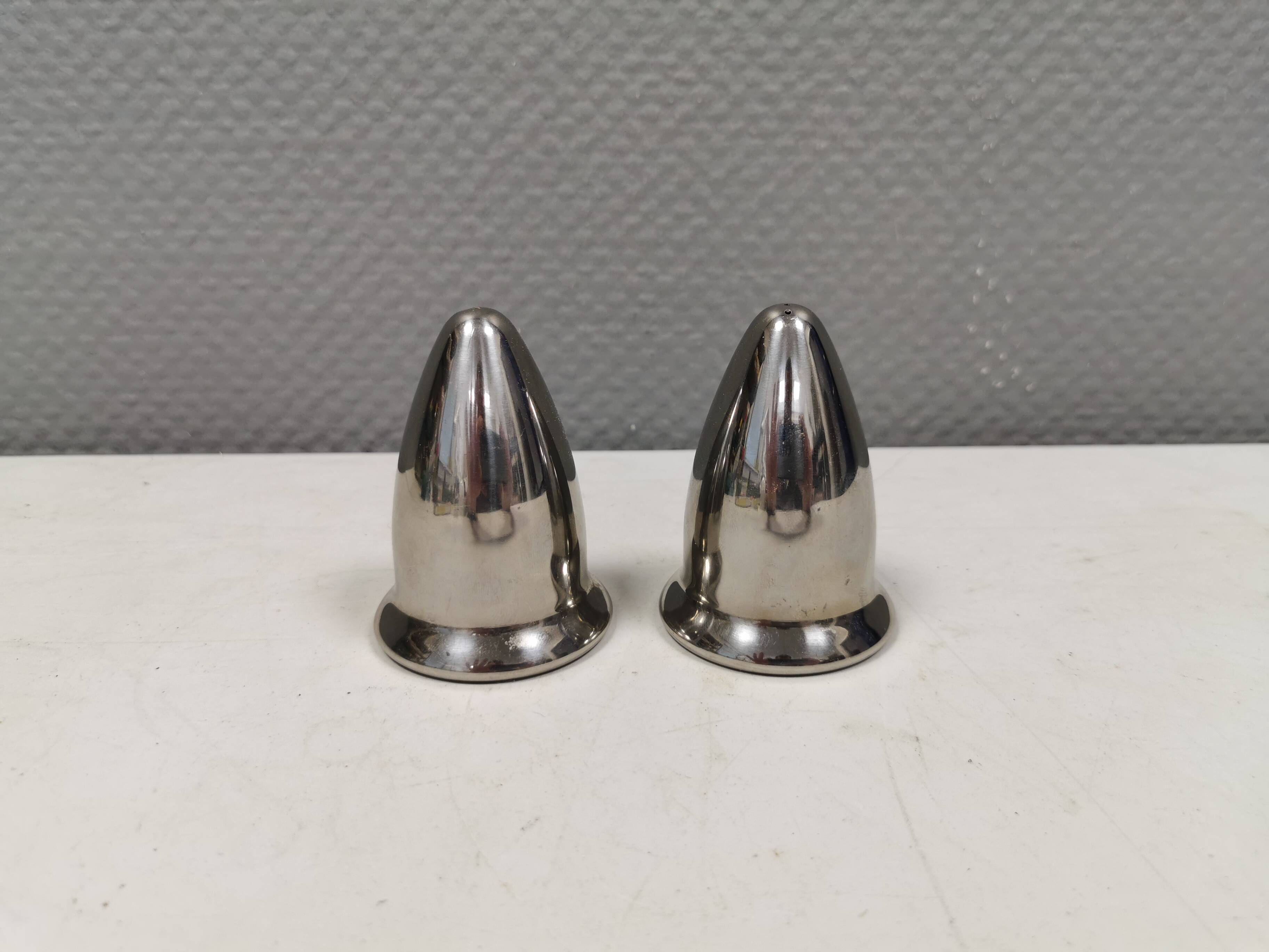 A beautiful stainless steel salt and pepper set, space age style 1980s.
