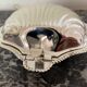 Shell-shaped metal butter dish