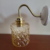Brass wall lamp and molded glass