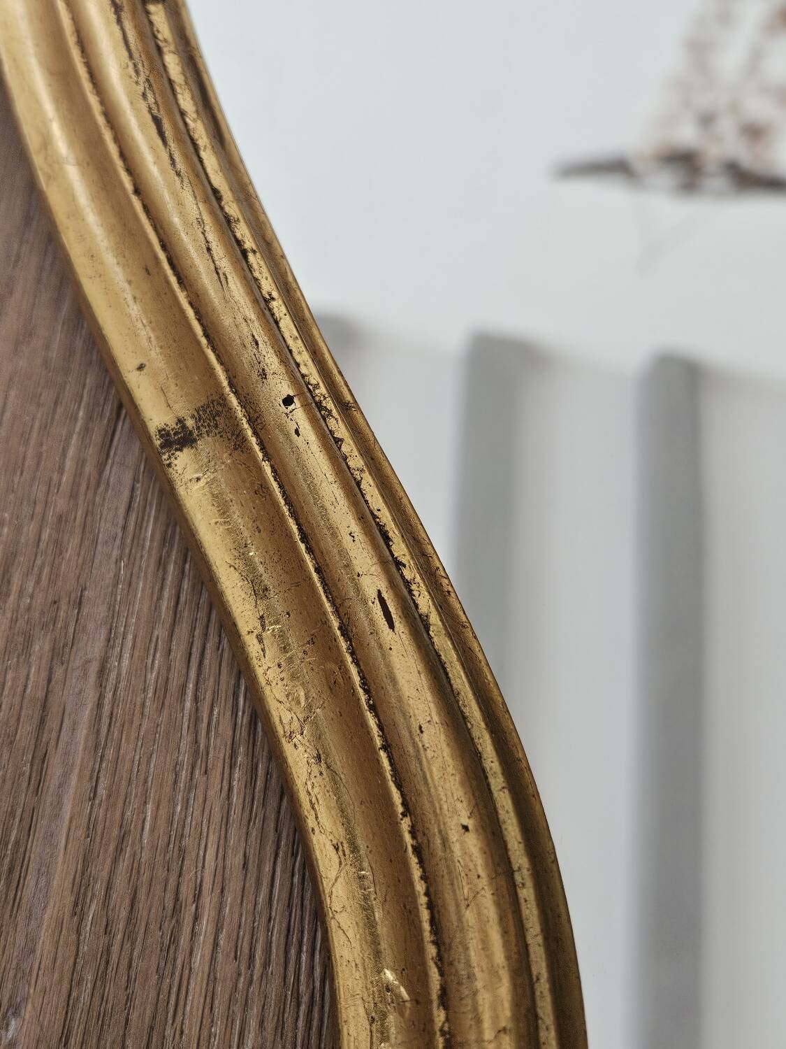 Rockery mirror under gilded frame