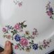 4 Bernardaud Limoges porcelain dinner plates with floral decoration, 1920s-1950s