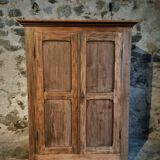 Antique French wardrobe in oak and pine, late 19th century.