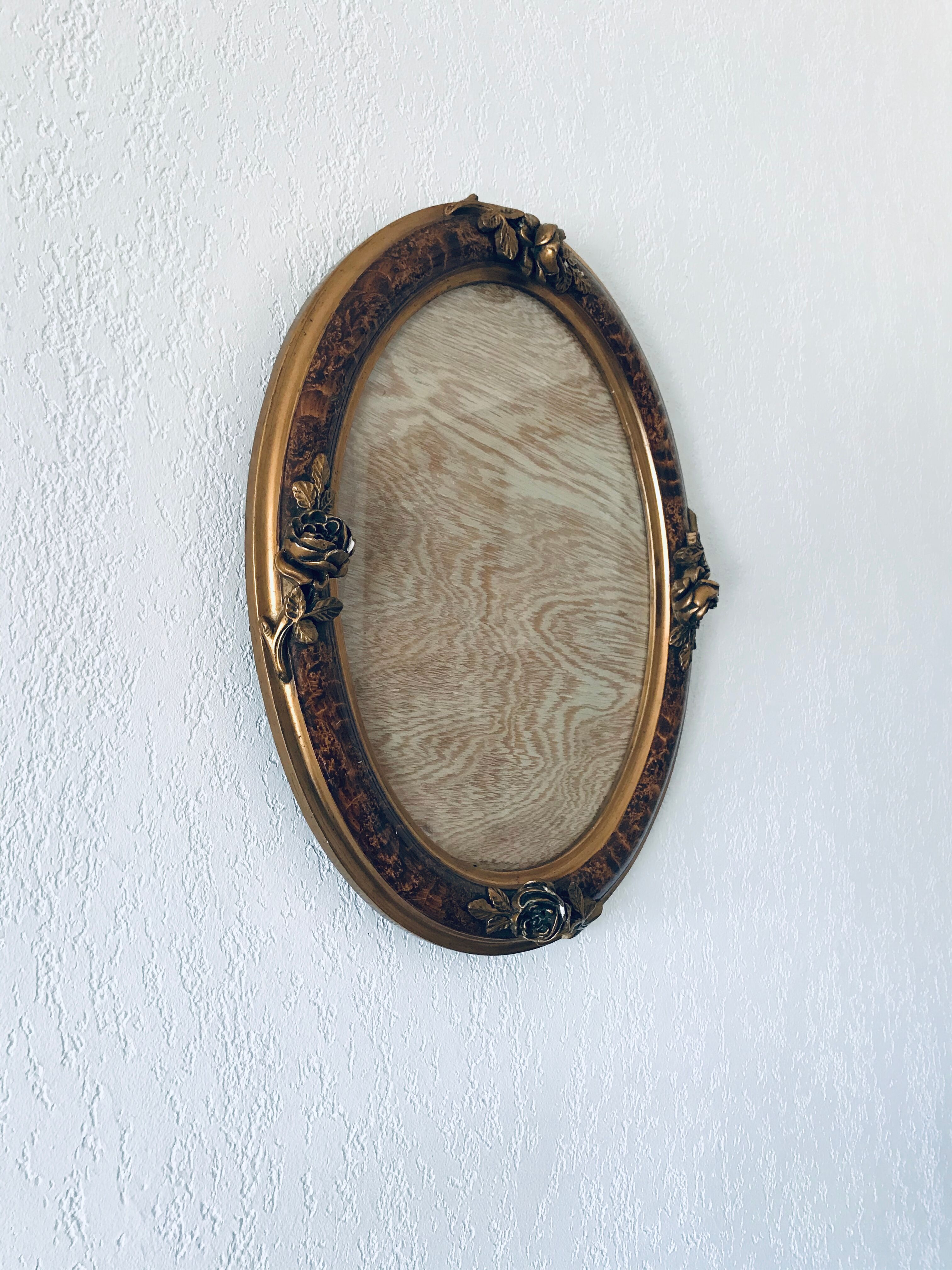 Golden old oval frame
