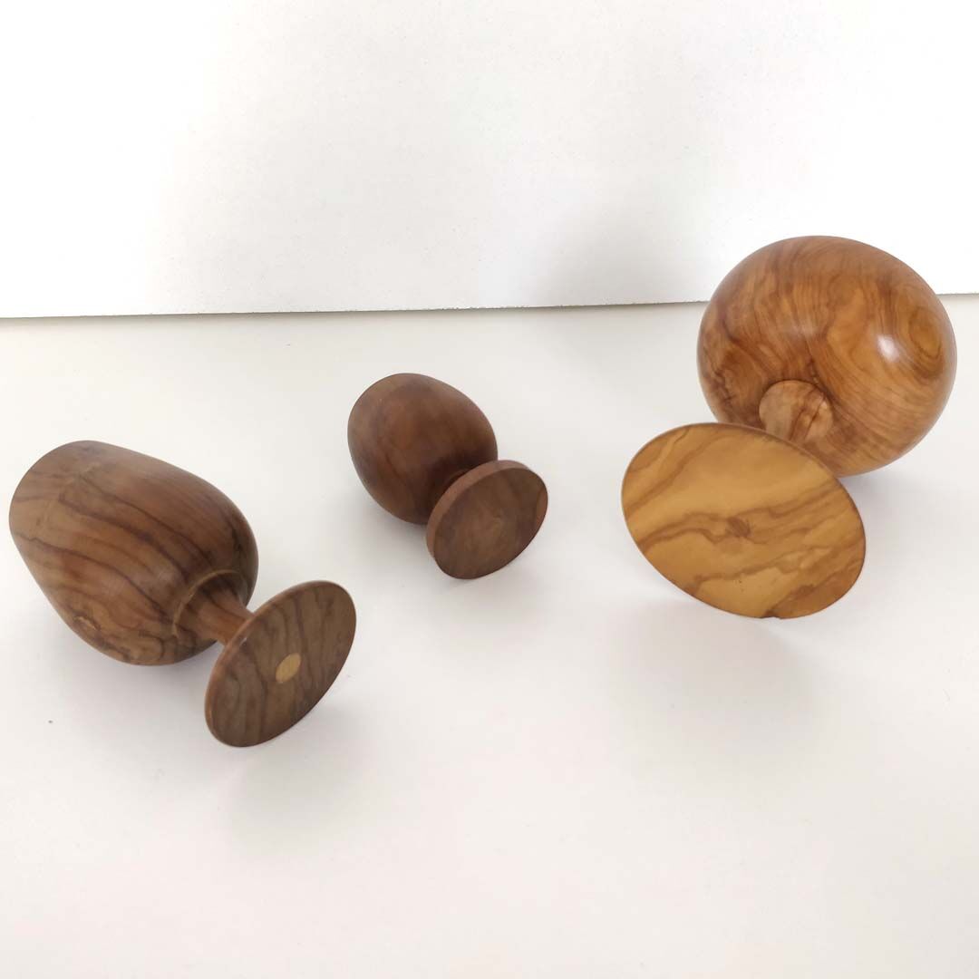 Trio of egg cup glasses and Scandinavian wooden cup