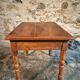 French vintage side table in cherry wood with a drawer.