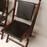 Pair of vintage "safari" folding armchairs in mahogany and leather