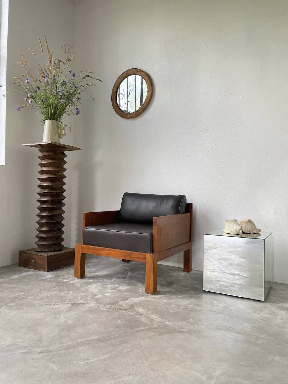Modernist armchair in exotic wood and leather