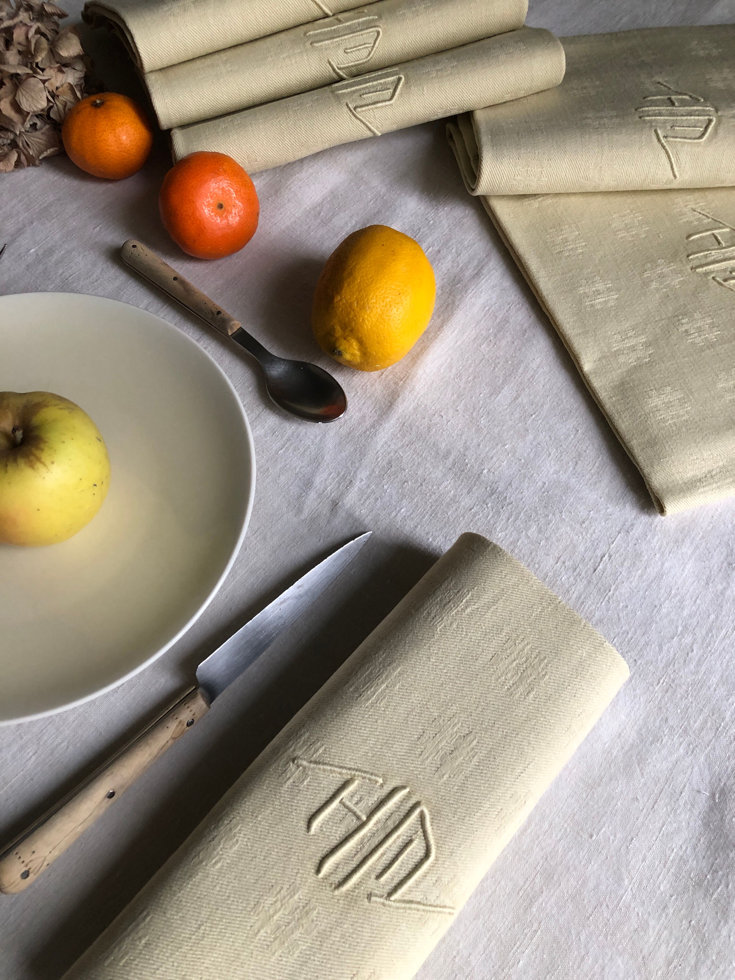 Antique napkins damascus and monogrammed tinted fresh butter