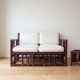 Two-seater sofa set and small lacquered violet rattan table.