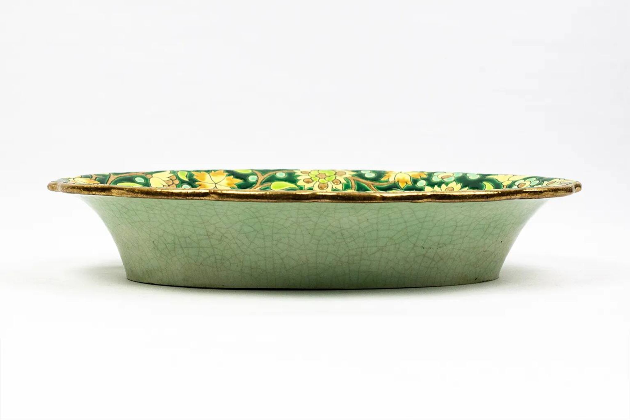 Longwy cup in cloisonné enamels on a green background, polychrome floral decoration and gold