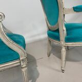 Pair of Louis XVI convertible armchairs